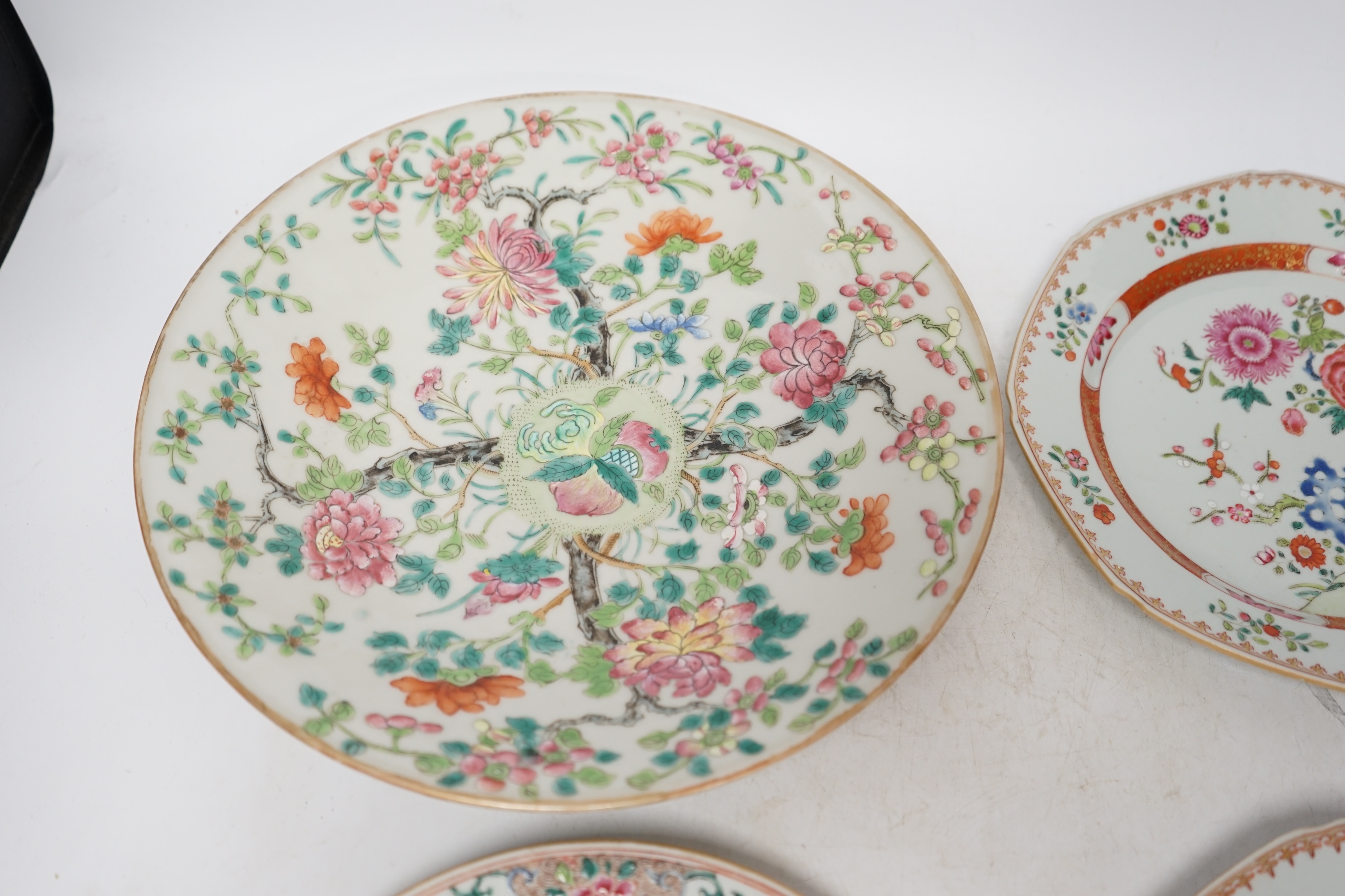 A pair of Chinese famille rose octagonal dishes, one other similar and a Cantonese dish, 18th/19th century, largest 29.5cm (4). Condition - circular famille rose dish with a restored area